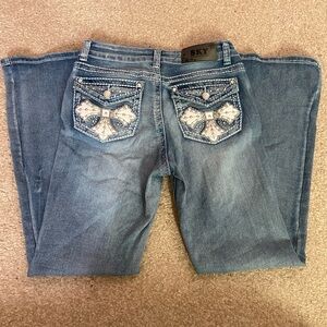 Sky flare rhinestone cross jeans